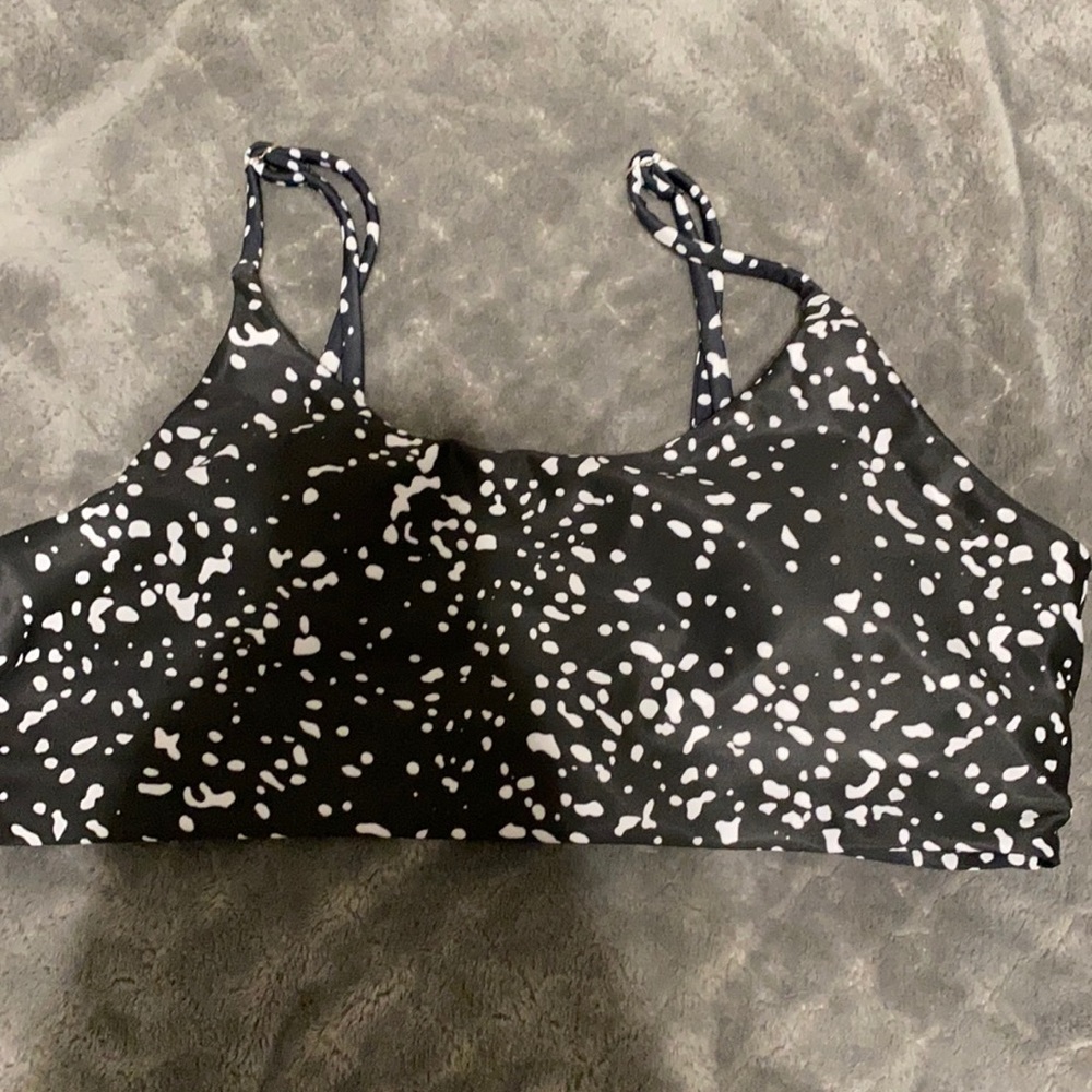black bikini top with white spots